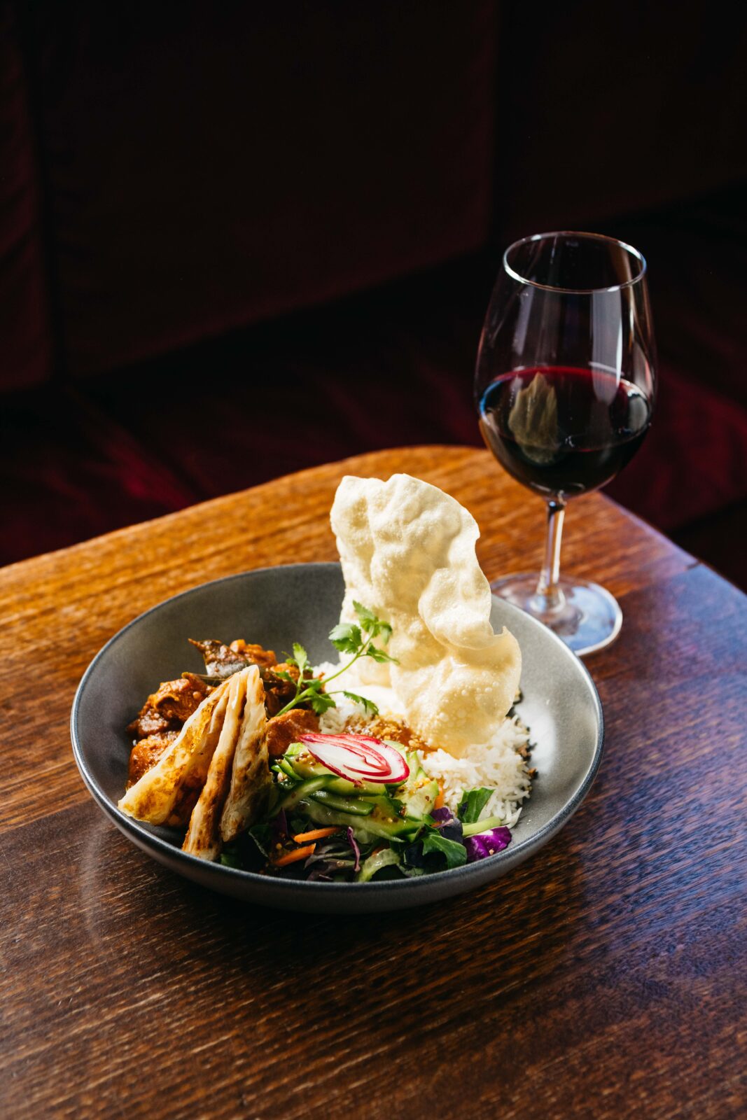 Curry night + half price house wine or a tap beer